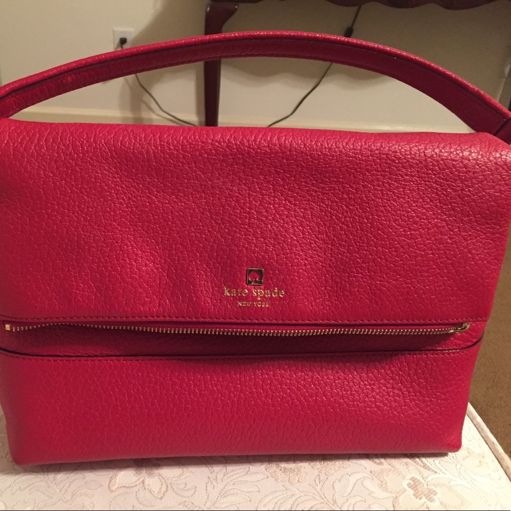 Red Kate Spade bag.