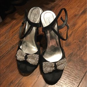 Black heels with rhinestone bow