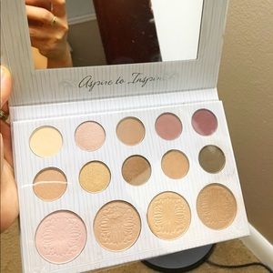 Carli Bybel 14 color eyeshadow with highlighter.