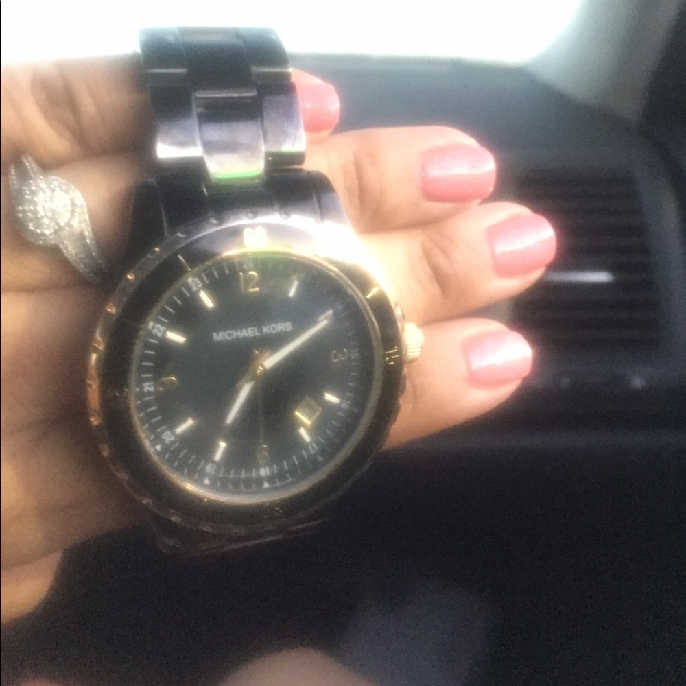 Authentic Michael Kors.