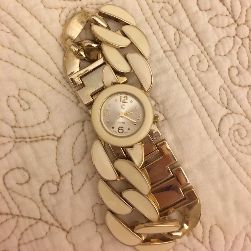 White & gold watch