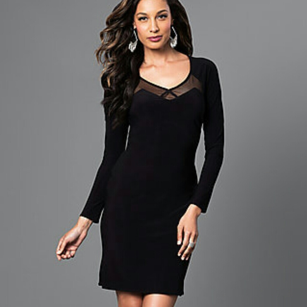Long-sleeve  cut- out. Short black dress