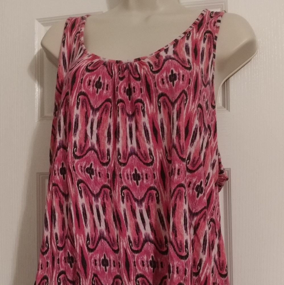 Sleeveless top with lace backing.