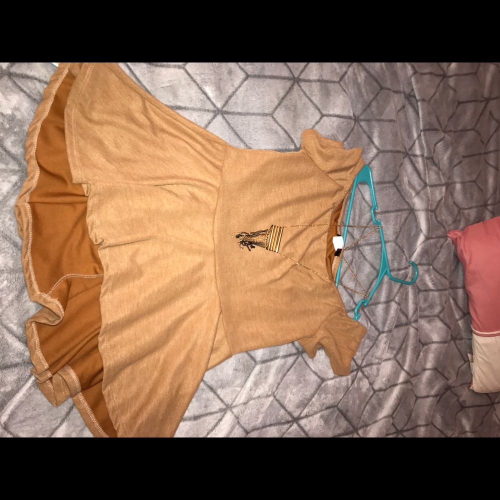 Nude high low peplum top