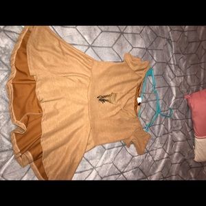 Nude high low peplum top