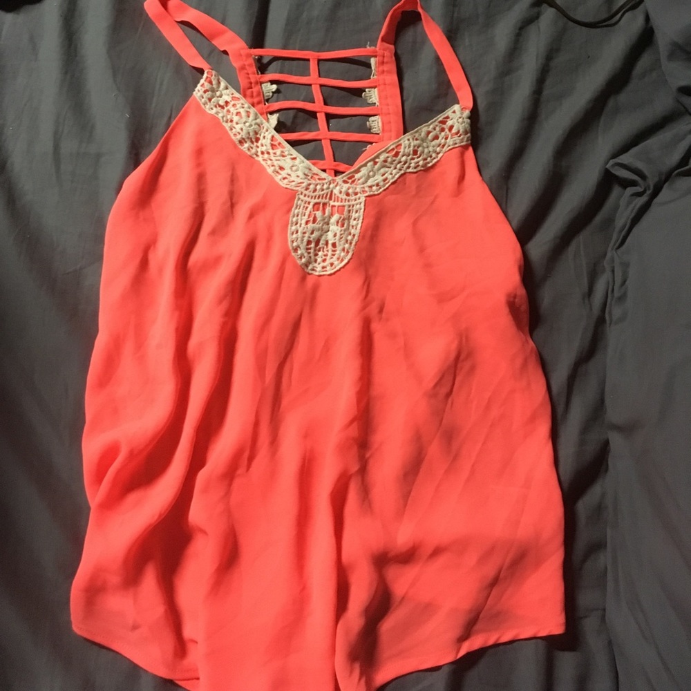 A neon pink blouse