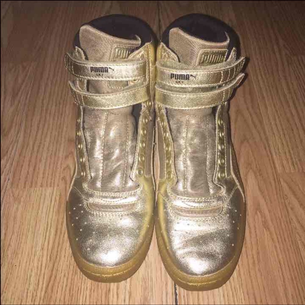 Gold hightop women's pumas size 8