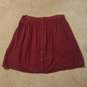 Burgundy button front skirt