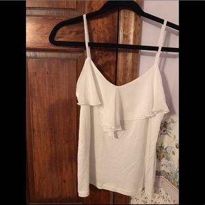 White sleeveless top
