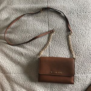 Accordion style cross body Michael kors purse