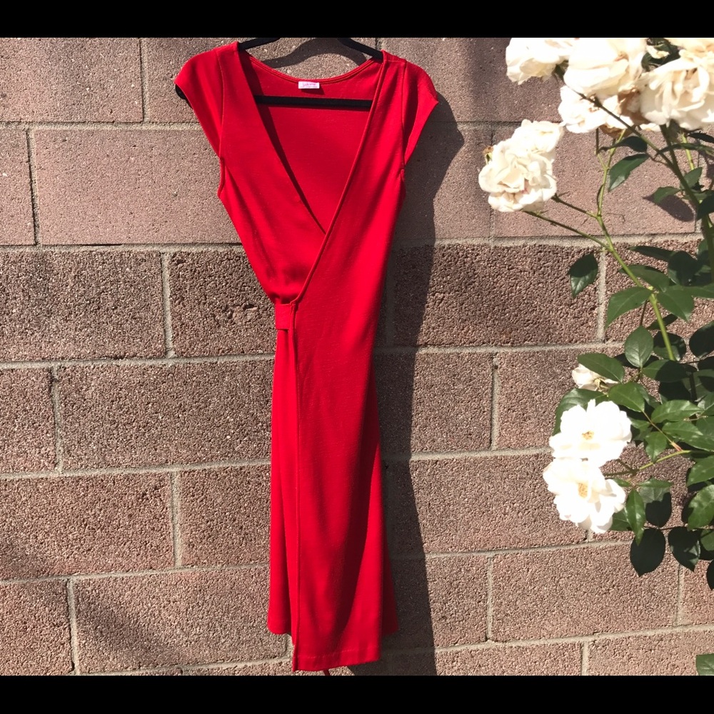 Diane Von Furstenberg back wrap dress. Size Med.