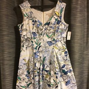 White floral sleeveless knee-length dress