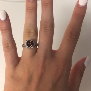 Brown gemstone and diamond ring