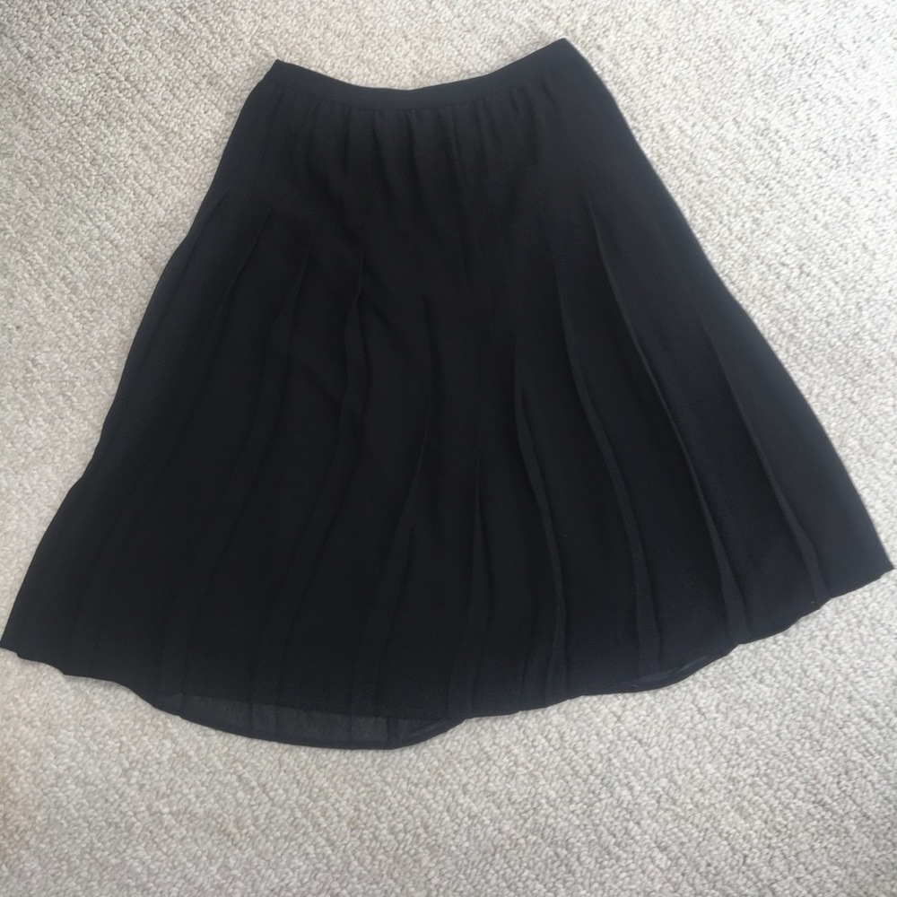 Pleated knee length black skirt- Urban Outfitters