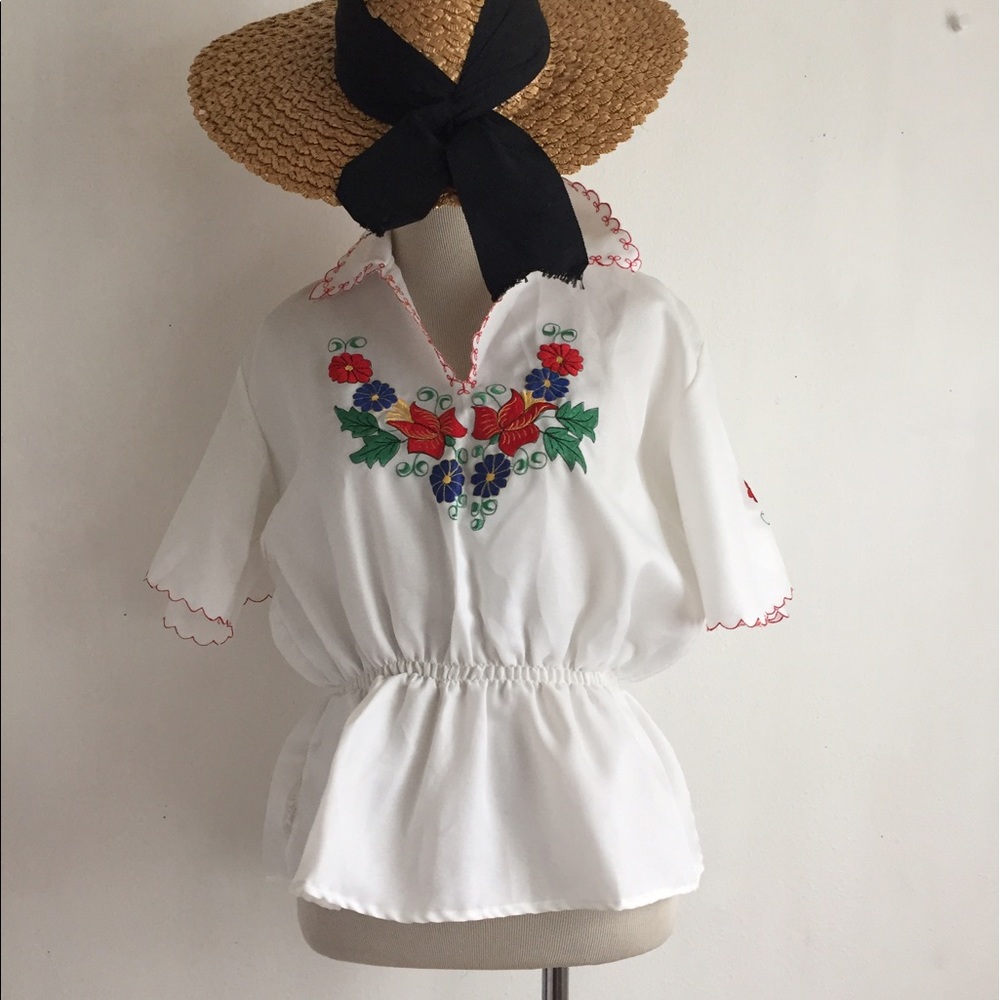 Vintage embroidered peplum blouse