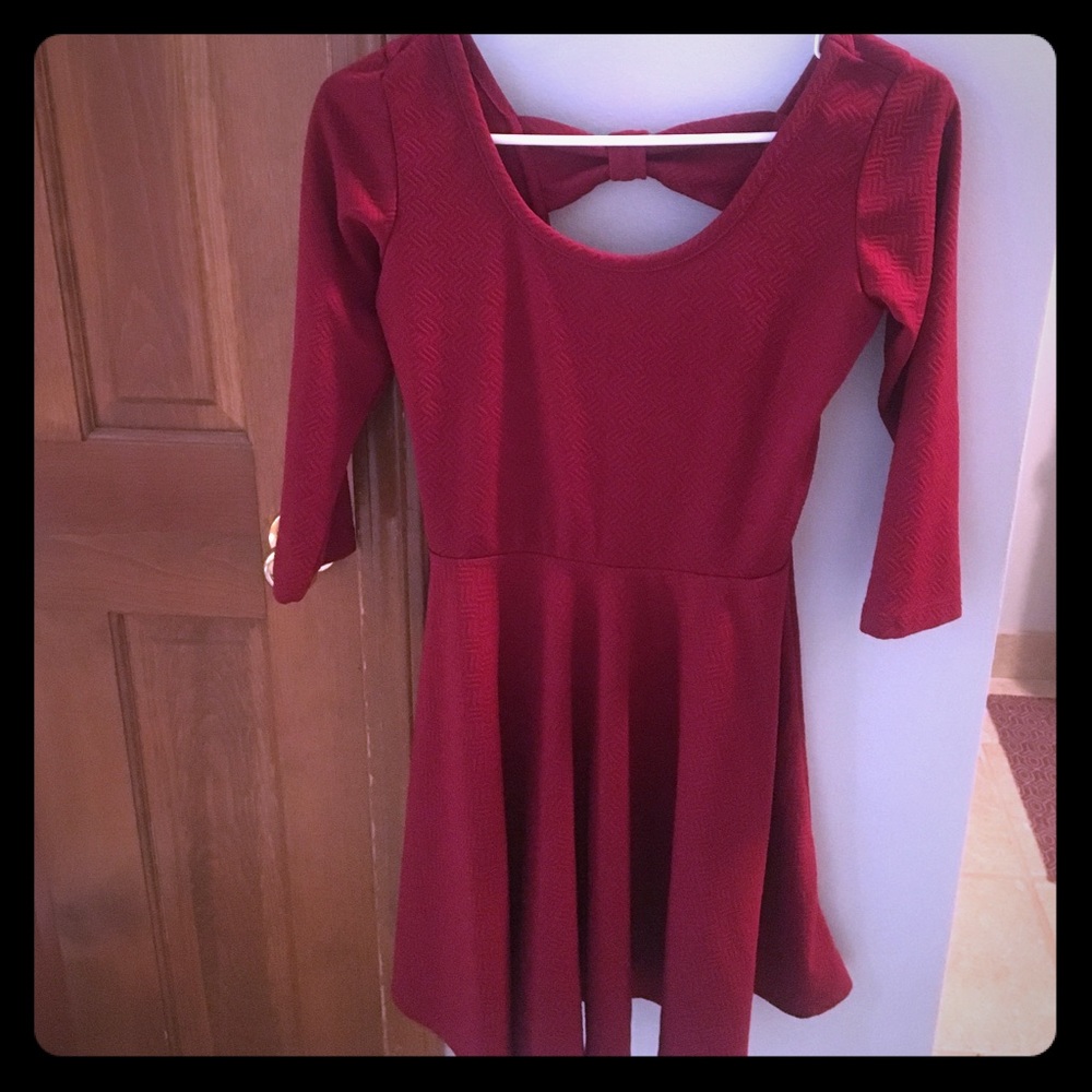 Red skater dress with bow back.