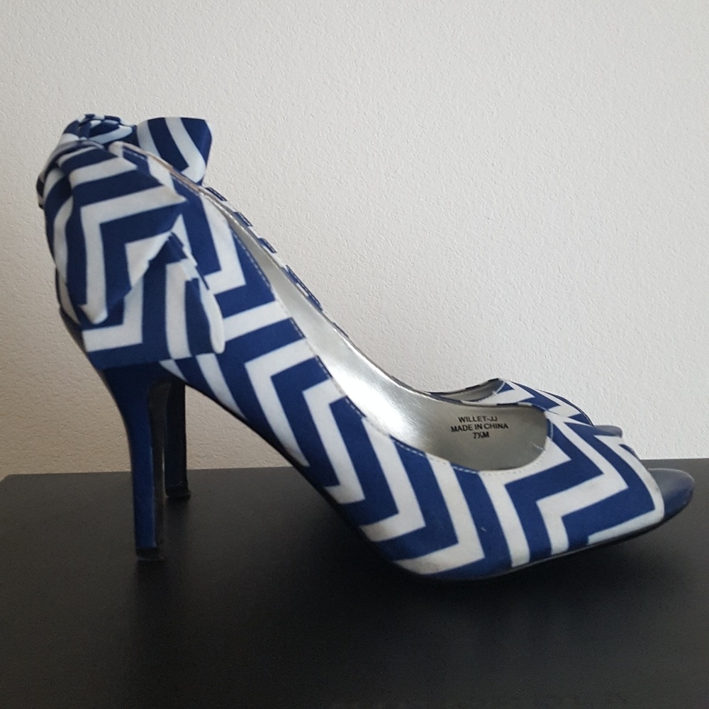 Stylish blue party heels with bow on the back