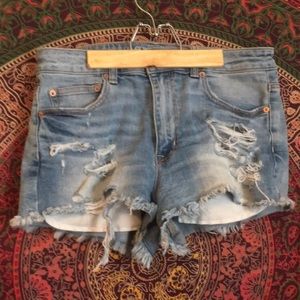 Distressed high rise festival shorts