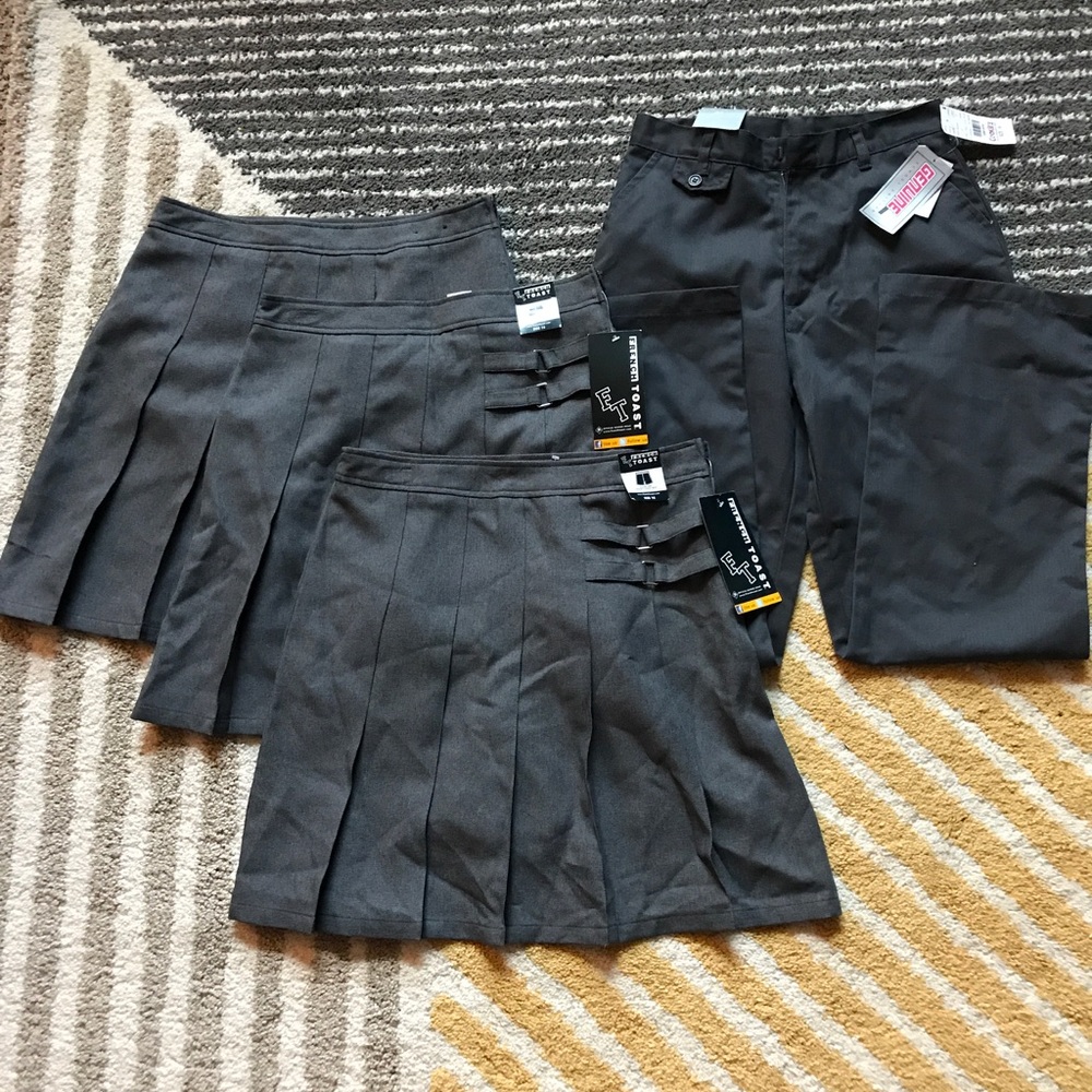 Lot of Grey uniform scooters and pants.