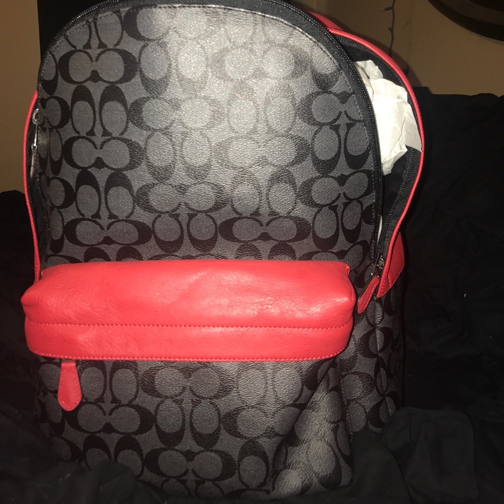 Black and red coach backpack