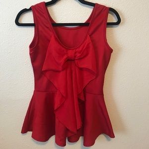 Red peplum shirt with bow in the back
