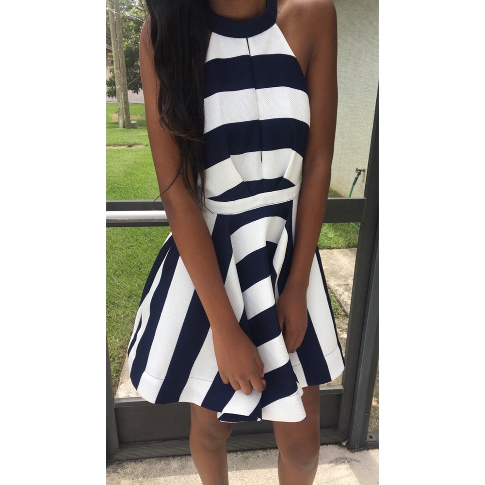 Only worn once. Navy blue and white dress.