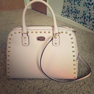 Light pink studded Michael Kors Purse.