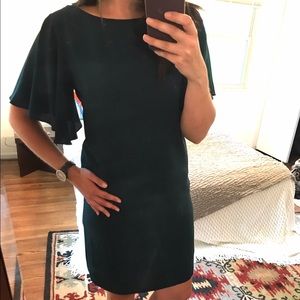 AGB teal dress with short butterfly sleeves.