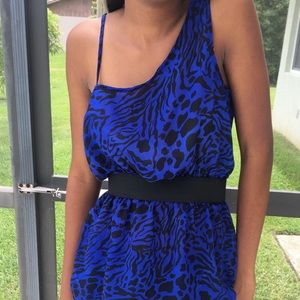 One shoulder. Animal print top.