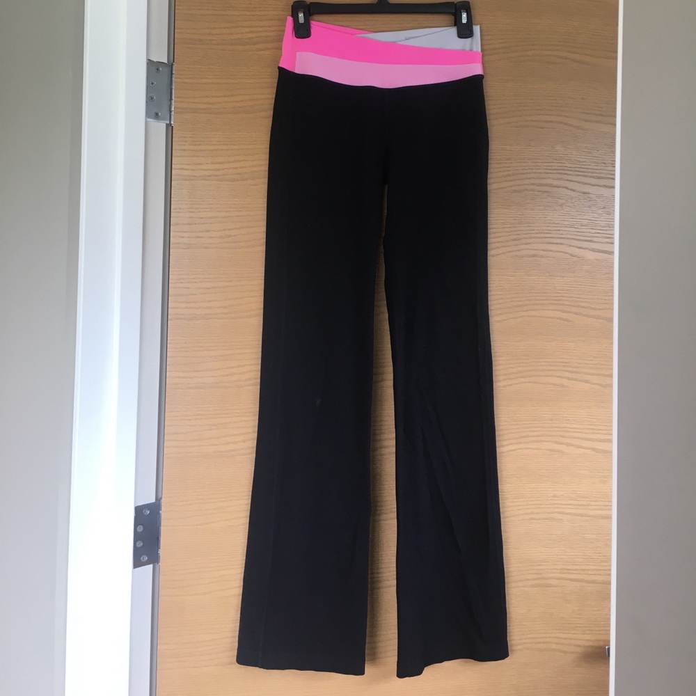 Lululemon pink/ black Flare leggings size 6