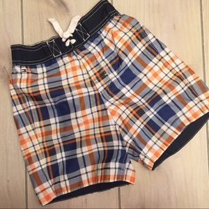 Plaid swim trunks
