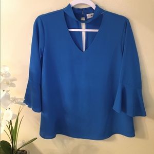 Bright blue blouse