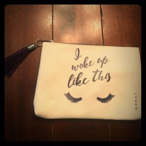 Zip top tasseled makeup bag by Monat. New!