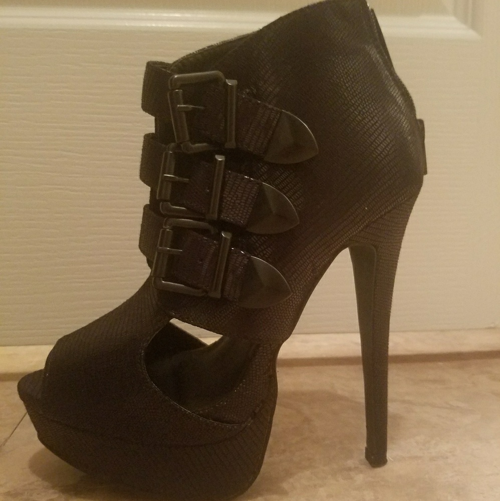 Strappy black high heels