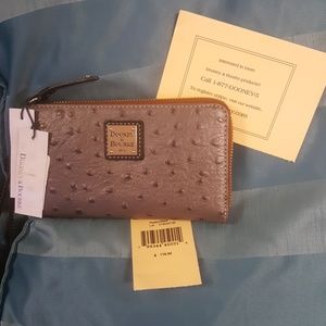 Brand new Dooney and Bourke wristlet