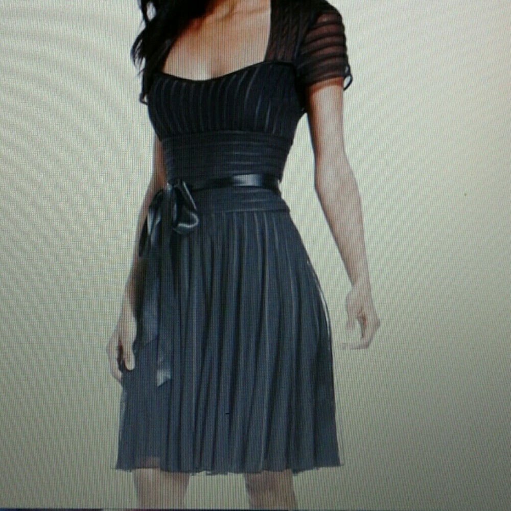 So pretty is this sheer mesh cap sleeve dress