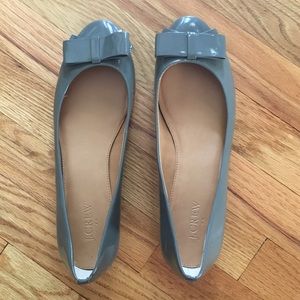 Gray J. Crew flats with heel and bow.