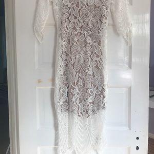 White long lace dress with open back