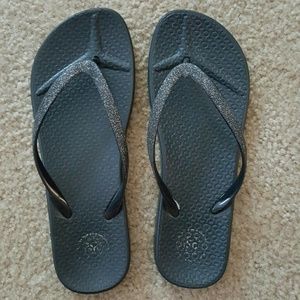 Black flip flops