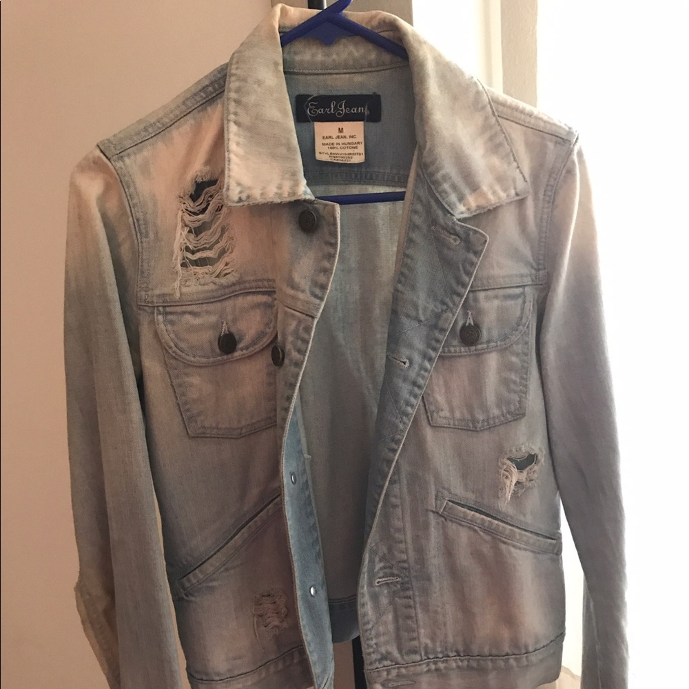 Light washed, ripped denim jacket