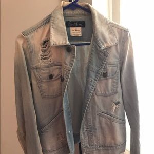 Light washed, ripped denim jacket
