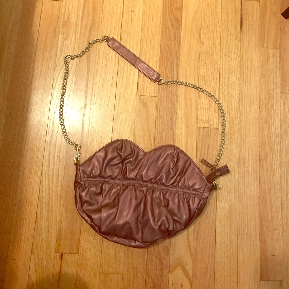 Lip shaped Bronze colored shoulder bag