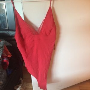 Red NWT body suit