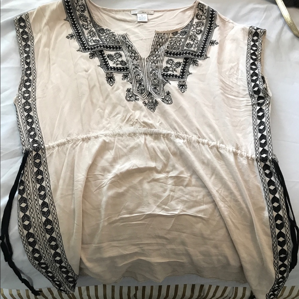 Creme short dress. Has only been worn once.