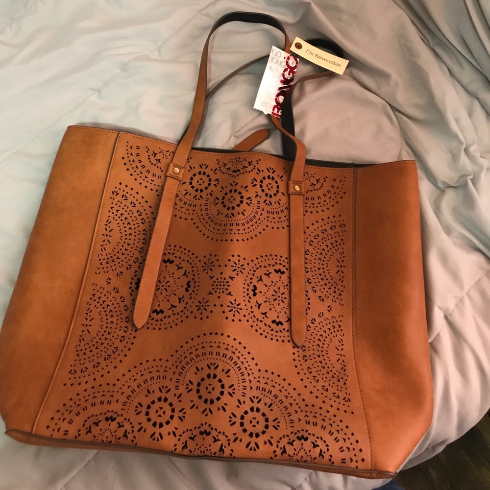 Reversible single pocket hand bag