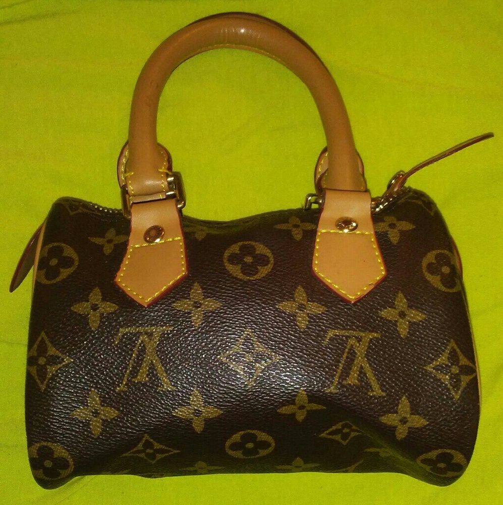 Louis Vuitton Mini HL Bag: