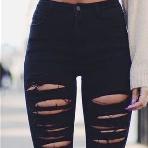 Black ripped jeans.