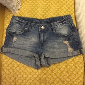 Distressed denim shorts
