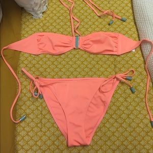 Bright orange two piece swim suit
