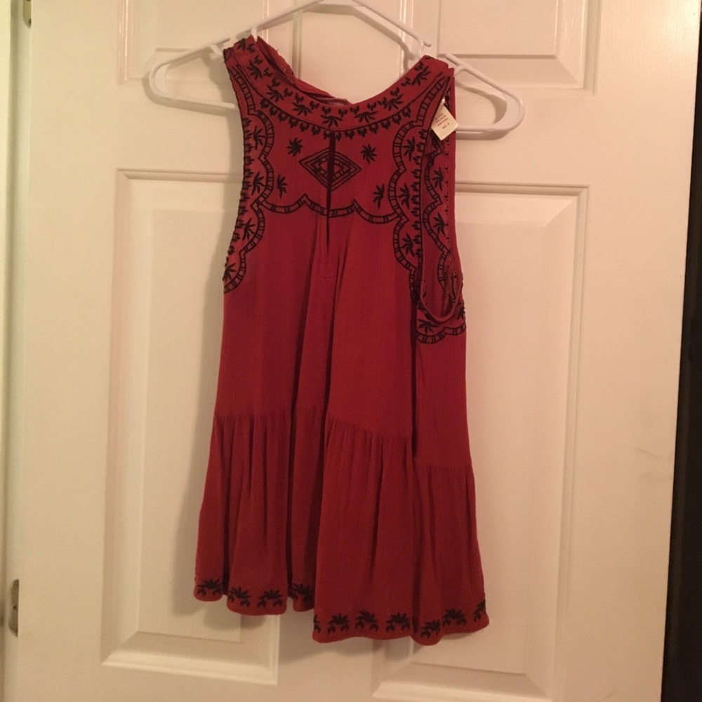 Cute top with front and back slits.
